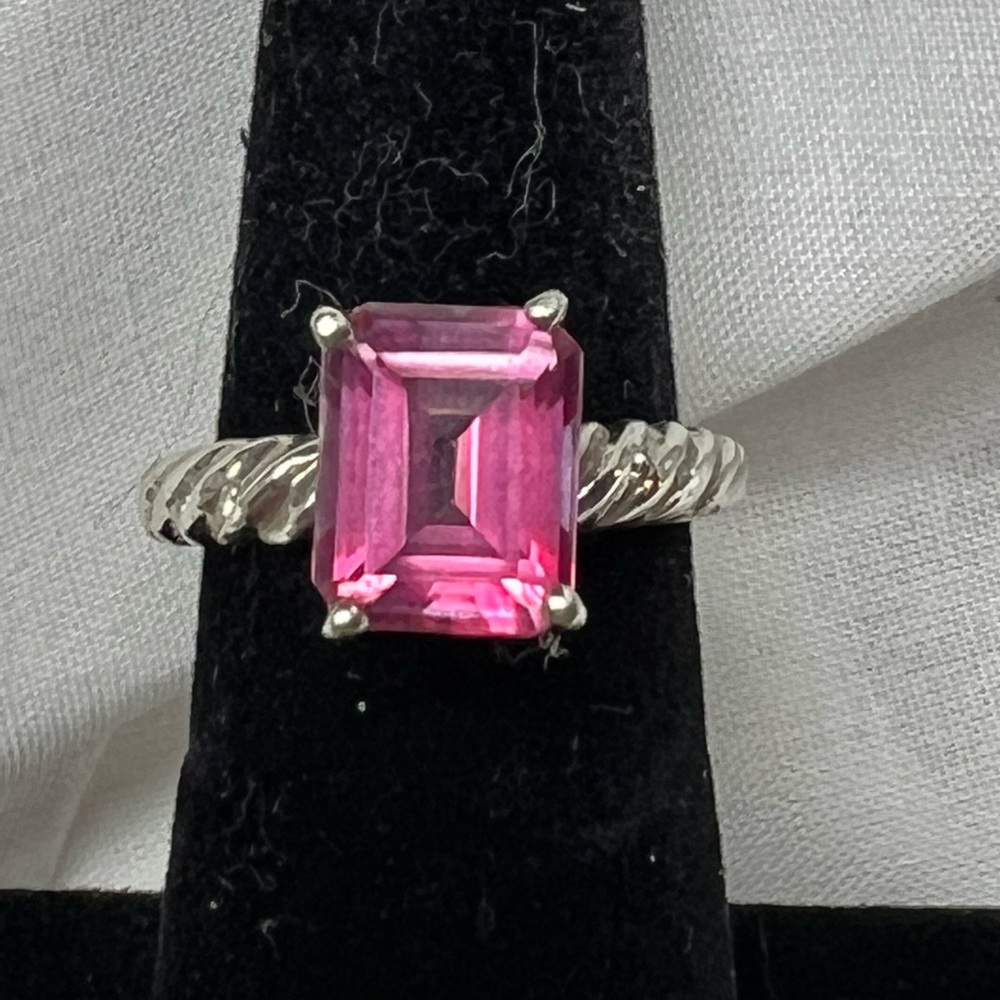 Sterling Silver ring with pink princess cut stone. Size 6.75